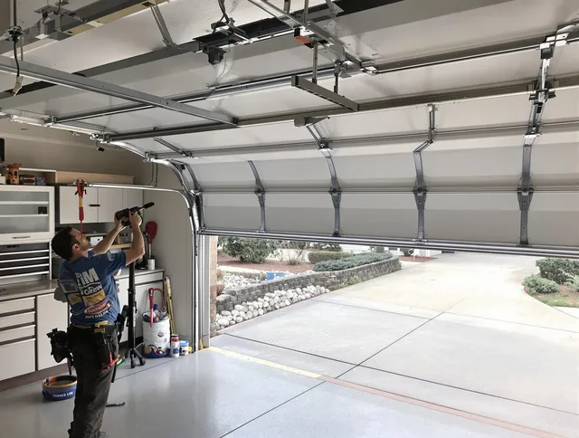 Garage door track repair service by Lincoln Garage Door Repair in Lincoln